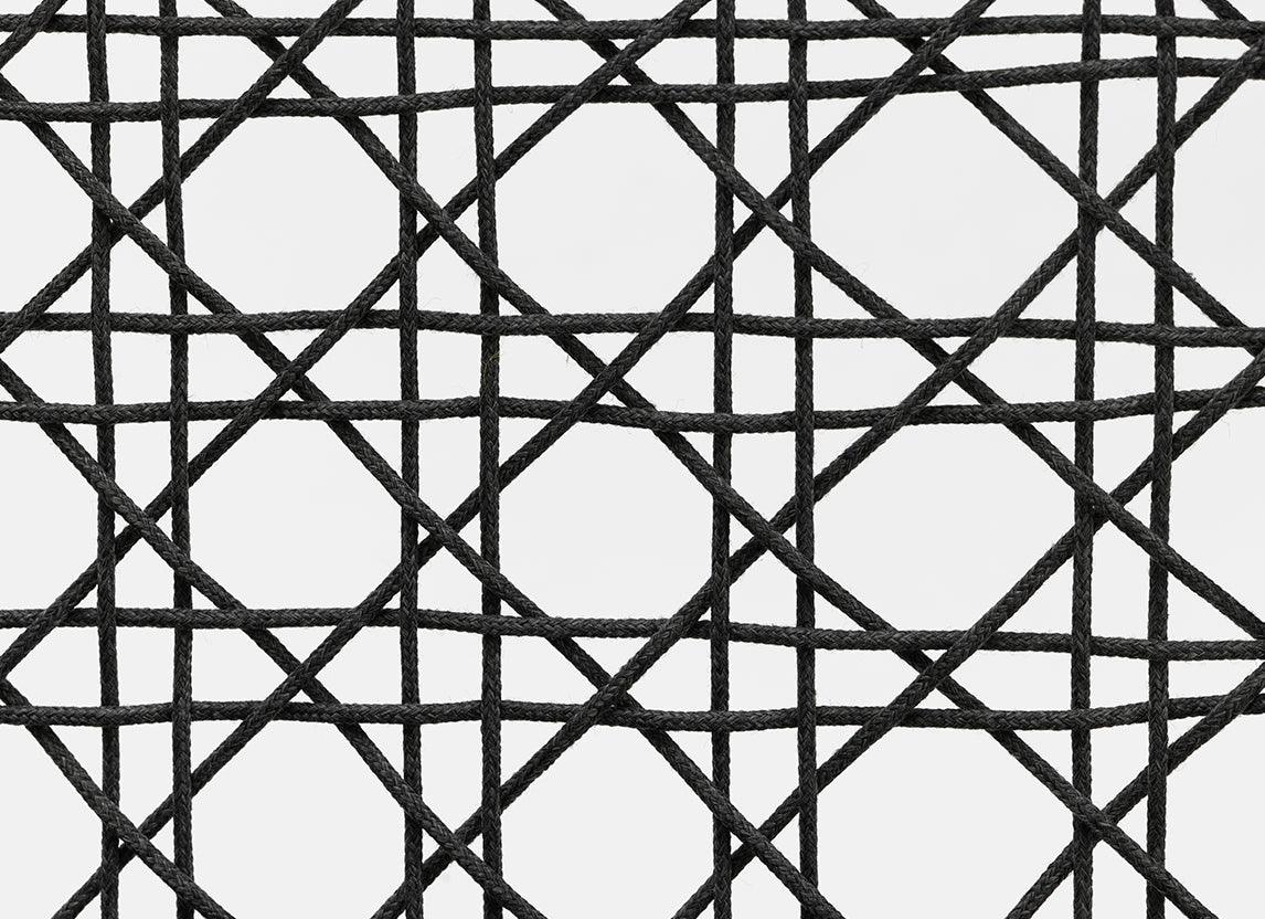 Fauteuil lounge tissé Aireys