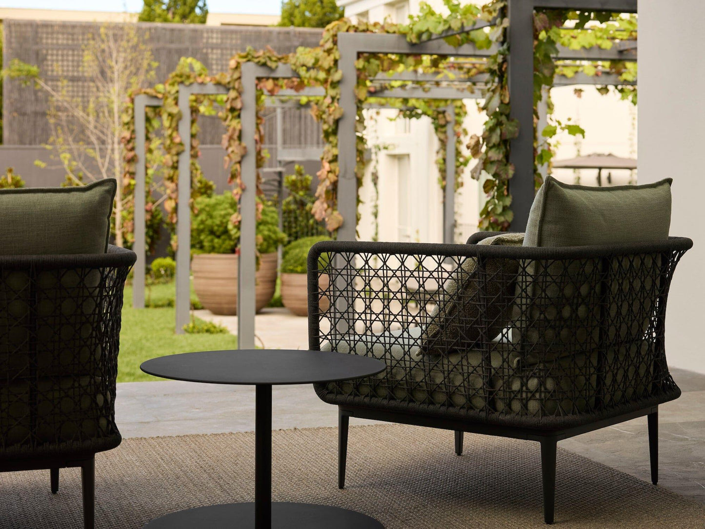 Fauteuil lounge tissé Aireys