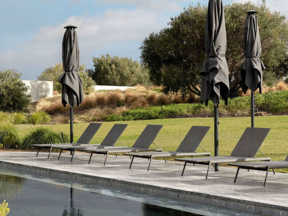 Fauteuil Branch blanc avec coussin rayé