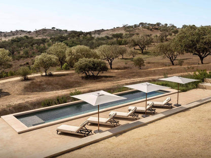 Parasol à mât central Caractere